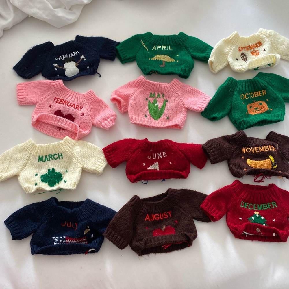 A bundle of each month sweater for Dolls
